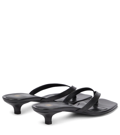 Shop Totême Leather Thong Sandals In Black