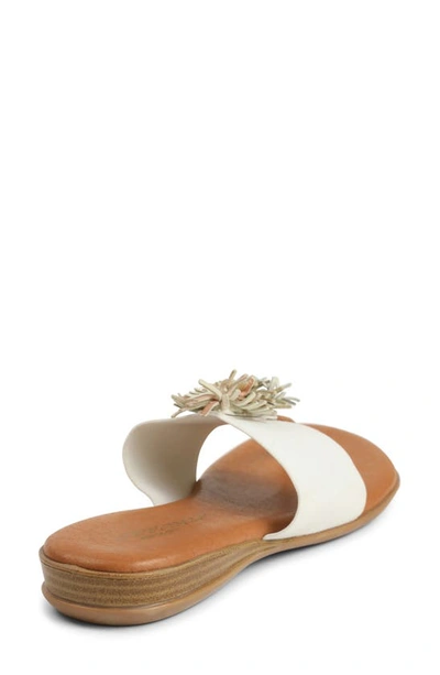 Shop Andre Assous Novalee Featherweights™ Sandal In White/ Metal