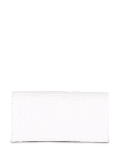 Shop Balmain Debossed Monogram Chain Wallet In White
