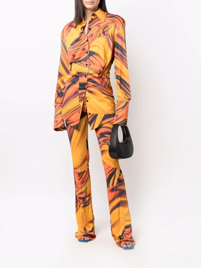 Shop Attico Abstract-print Flared Trousers In Orange