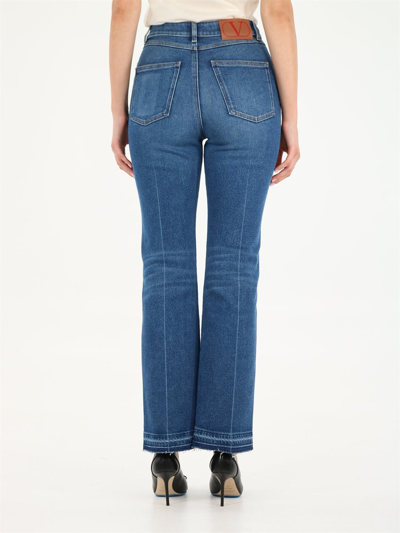 Shop Valentino Flared Jeans In Denim In Blue