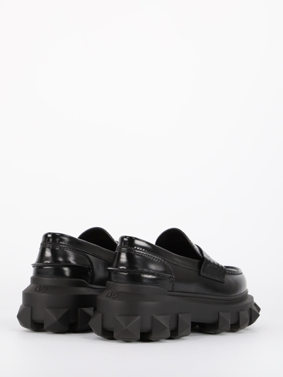 Shop Valentino Trackstud Loafers In Black