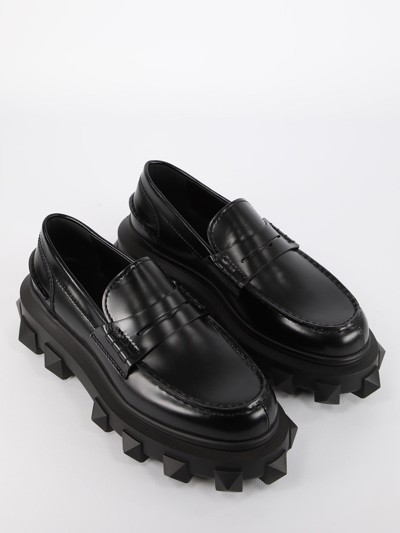 Shop Valentino Trackstud Loafers In Black