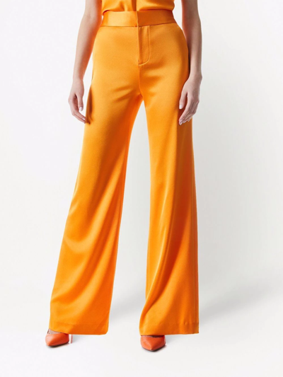 Shop Alice And Olivia Deanna Bootcut Trousers In Orange