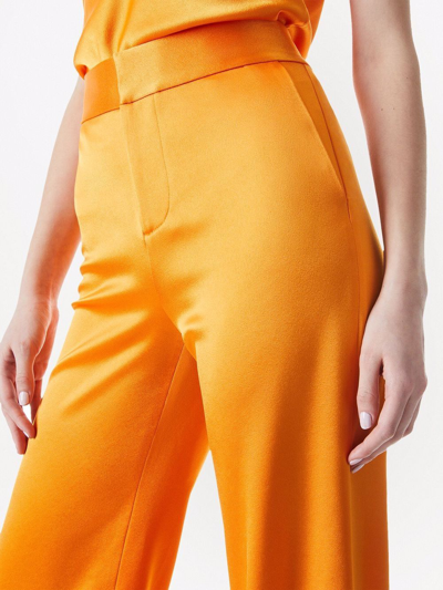 Shop Alice And Olivia Deanna Bootcut Trousers In Orange