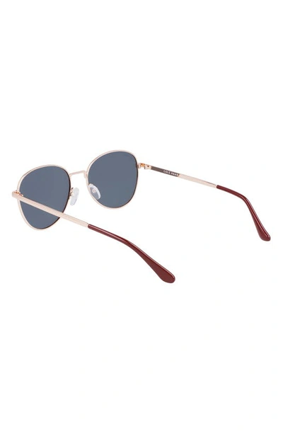 Shop Cole Haan 54mm Polarized Round Sunglasses In Burgundy