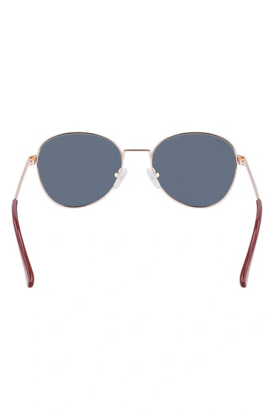 Shop Cole Haan 54mm Polarized Round Sunglasses In Burgundy