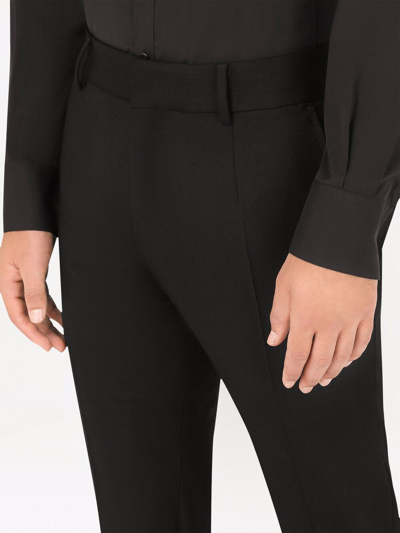 Shop Dolce & Gabbana Tailored Stretch-wool Trousers In Black