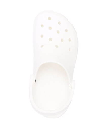 Shop Crocs Classic Clog Shoes In White