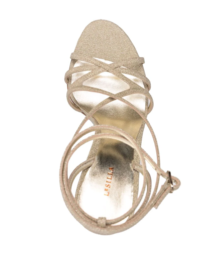 Shop Le Silla Metallic Strap-wrap Sandals In Gold