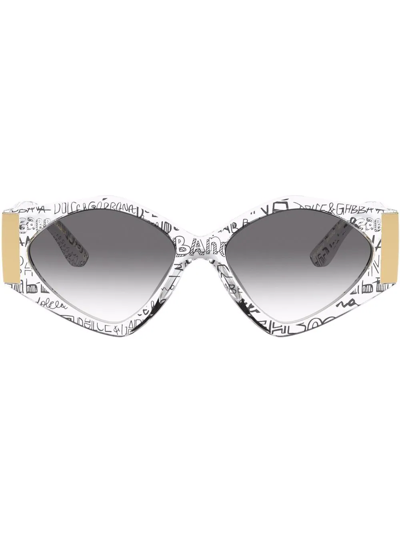 Shop Dolce & Gabbana Modern Print Graffiti Sunglasses In 9v000 Transparent