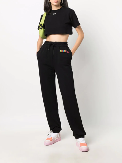 Shop Moschino Organic-cotton Logo Track Pants In Black