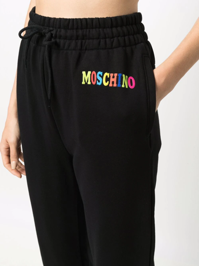 Shop Moschino Organic-cotton Logo Track Pants In Black