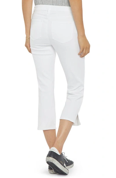 Shop Nydj Chloe Side Slit Capri Jeans In Optic White