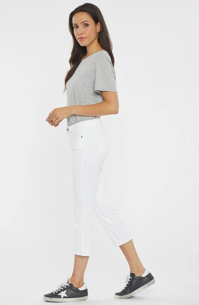 Shop Nydj Chloe Side Slit Capri Jeans In Optic White