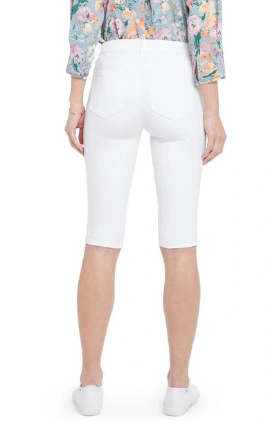 Shop Nydj Denim Bermuda Shorts In Optic White