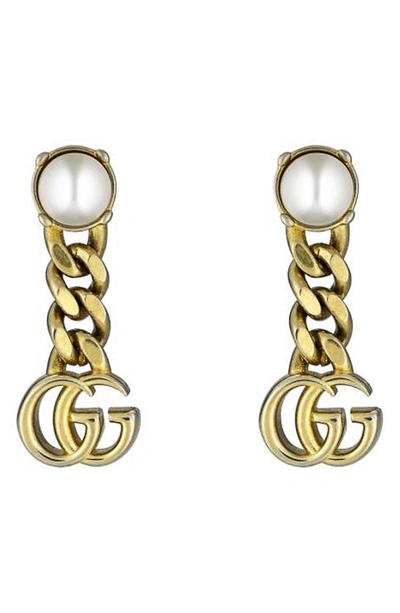 Shop Gucci Imitation Pearl Logo Drop Earrings In Gold
