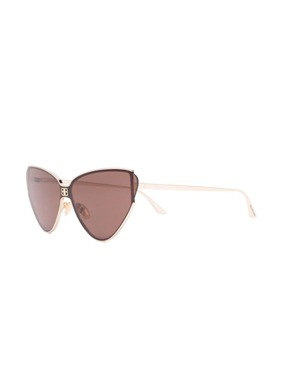 Shop Balenciaga Cat-eye Frame Sunglasses In Gold