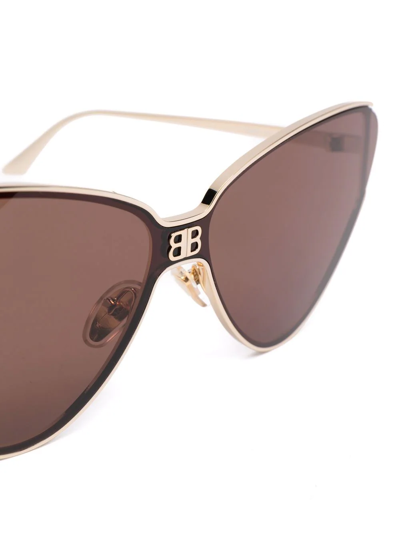 Shop Balenciaga Cat-eye Frame Sunglasses In Gold