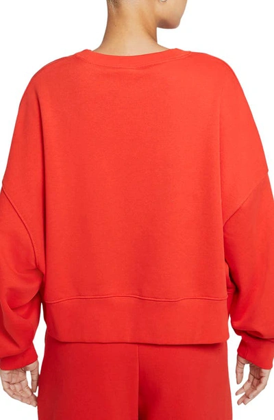 Shop Nike Sportswear Essential Oversize Sweatshirt In Chile Red/ White
