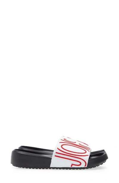 Shop Jordan Nola Sport Slide In White/ Gym Red/ Black