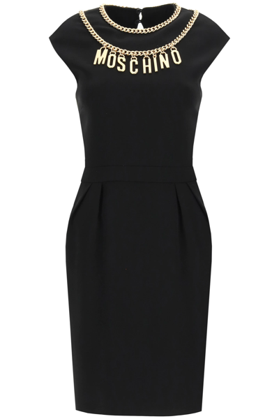 Shop Moschino Short Dress With Logo Lettering And Charm In Black,gold