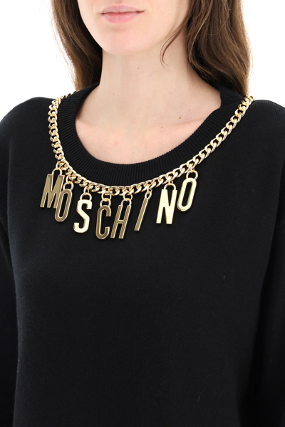 Shop Moschino Mini Dress With Logo Lettering Charm In Black,gold