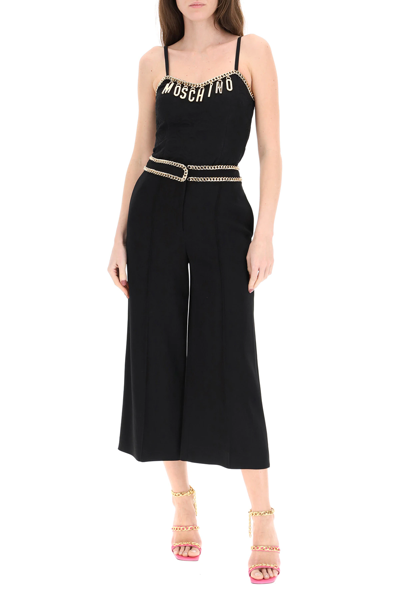 Shop Moschino Crop Trousers With Groumette Chains In Black