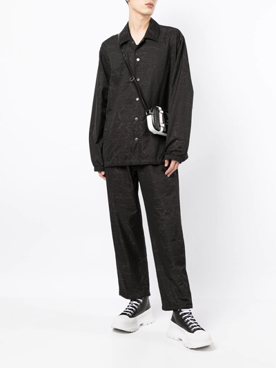 Ports V All-over Logo Print Trousers In Black