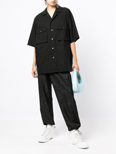 Ports V All-over Logo Print Trousers In Black