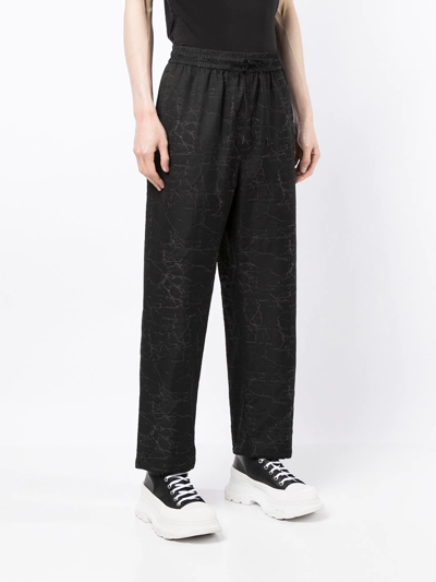 Ports V All-over Logo Print Trousers In Black