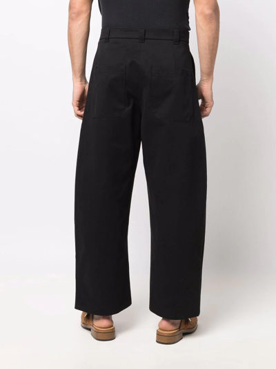 Studio Nicholson Sorte Pleated Cotton-twill Wide-leg Trousers In Black