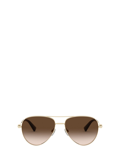 Shop Valentino Eyewear Aviator Frame Sunglasses In Gold