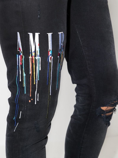 Shop Amiri Logo-embroidered Skinny Jeans In Black