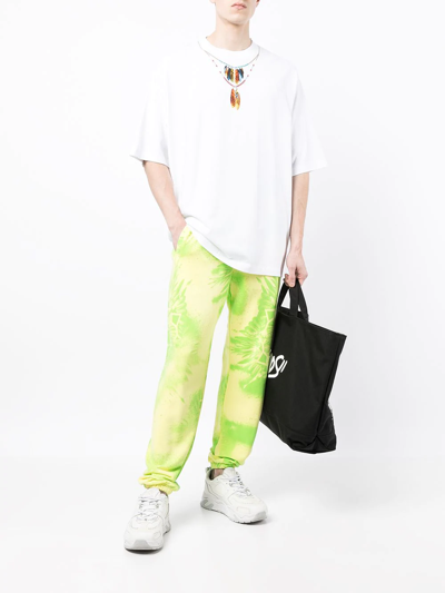 Shop Marcelo Burlon County Of Milan Kaleidoscope Wings-print Track Pants In Yellow