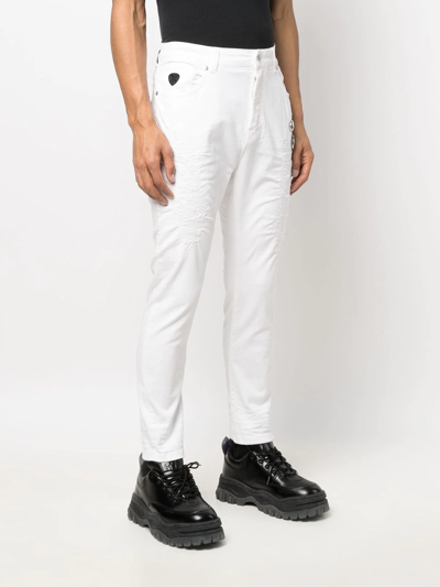 Shop John Richmond Cotton Skinny Jeans In White