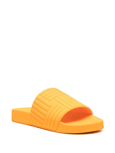 Shop Bottega Veneta Intrecciato Logo-embossed Slides In Orange