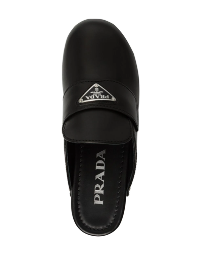 Shop Prada Studded Logo Clogs In Black