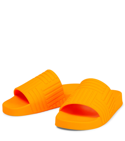 Shop Bottega Veneta Slider Embossed Rubber Slides In Tangerine