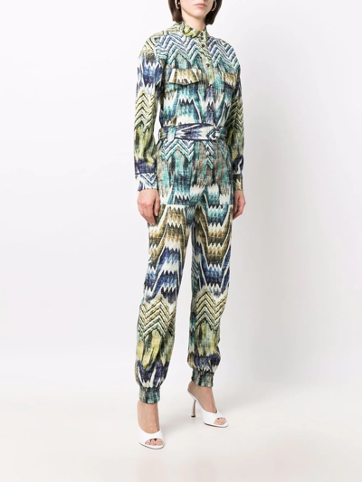 Chufy Patterned Belted Jumpsuit In Grün