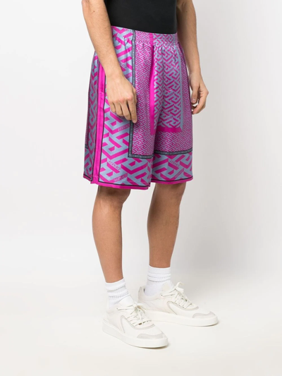 Shop Versace La Greca Panelled-print Bermuda Shorts In Pink