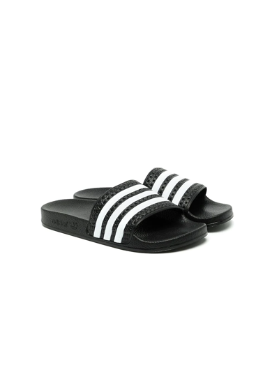 Shop Adidas Originals Adilette J Slides In Black