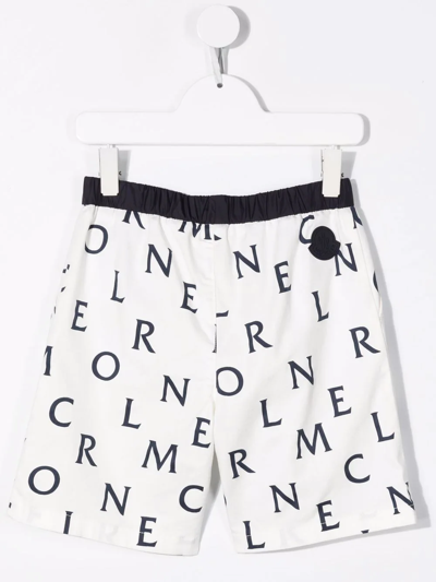 Shop Moncler All-over Logo Print Shorts In White