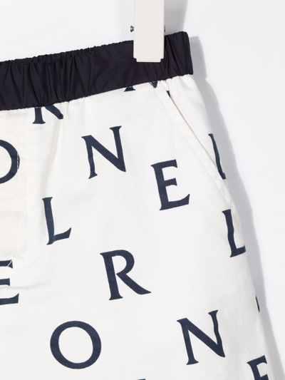 Shop Moncler All-over Logo Print Shorts In White