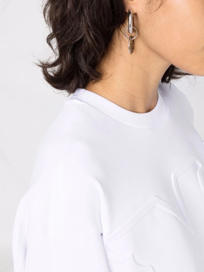 Shop Emporio Armani Embossed-logo Long-sleeved Sweatshirt In White