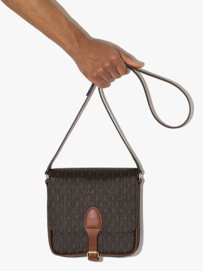 Shop Saint Laurent Monogram-print Messenger Bag In Brown