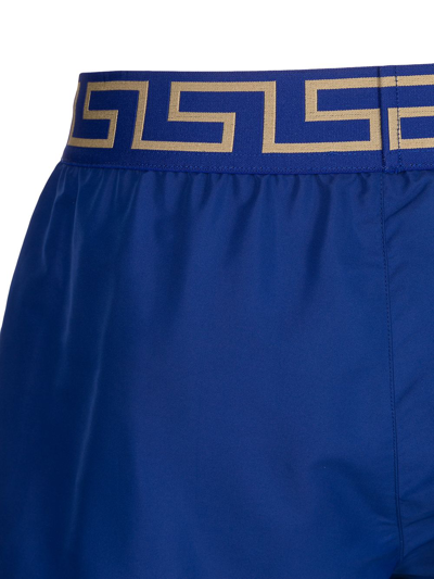 Shop Versace Greca-waistband Swim Shorts In Blue