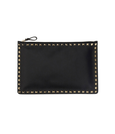 Shop Valentino Garavani Rockstud Zipped Clutch Bag In Black