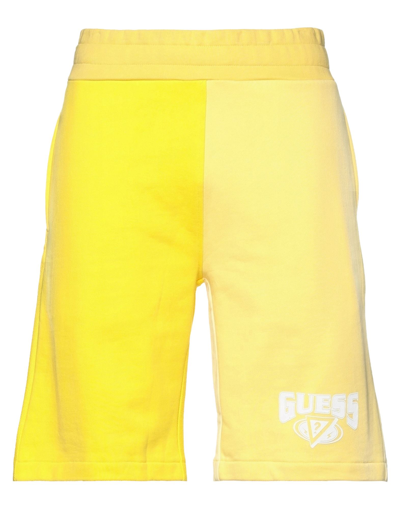 Shop Guess Man Shorts & Bermuda Shorts Yellow Size S Cotton