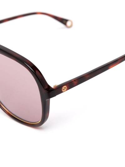 Shop Gucci Gg1077s Pilot Sunglasses In Brown